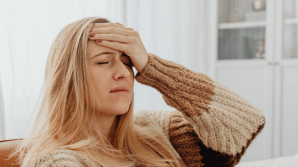 Woman with a Migraine